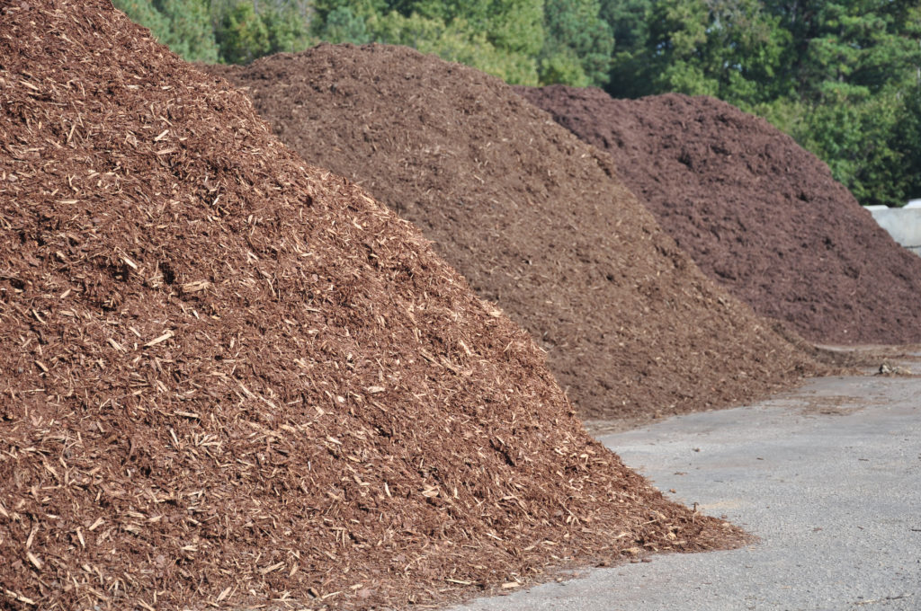 Three different types of mulch for sale at garden center