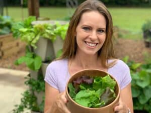 Jill holding fall salad greens